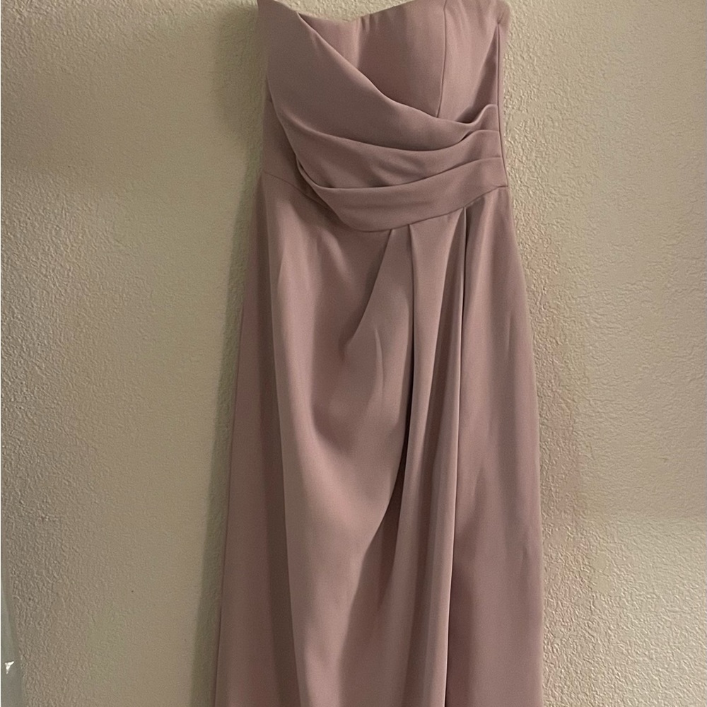 Beautiful dress can be either wedding or prom.